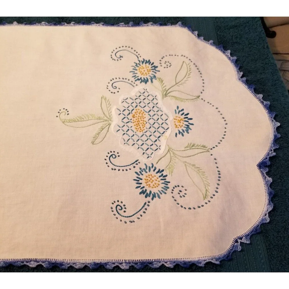 vintage handmade floral needlework table runner with a crocheted border